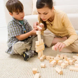 Mother and son building